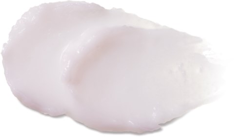 Romige witte substantie, glad en glanzend, lijkt op een cosmetische of huidverzorgingscrème of lotion.