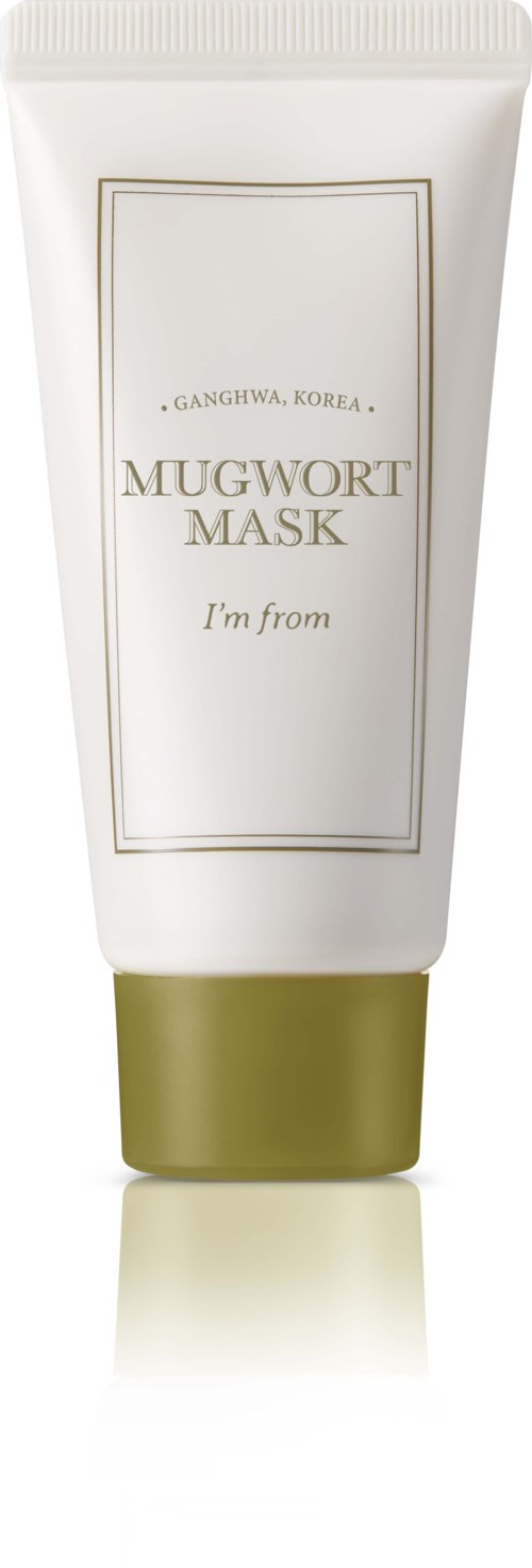 Eine weiße Tube mit grünem Deckel, bezeichnet als Mugwort Mask aus Korea, für Hautpflege.