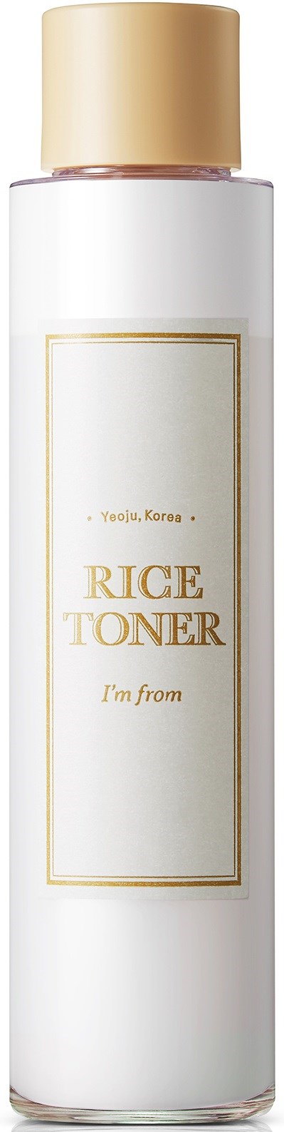 A tall white bottle with a gold cap, labeled 'Rice Toner' from Korea, used for skincare.