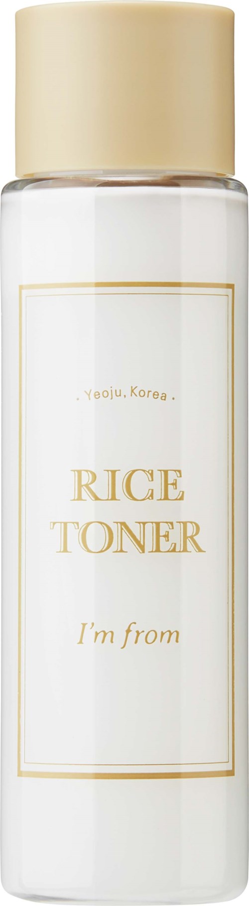 A clear bottle with a beige lid labeled 'Rice Toner' from Korea, likely for skincare.
