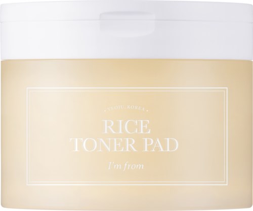 En behållare för ris toner pads, i huvudsak beige med vit lock, varumärkesnamn och produktbeskrivning på framsidan.