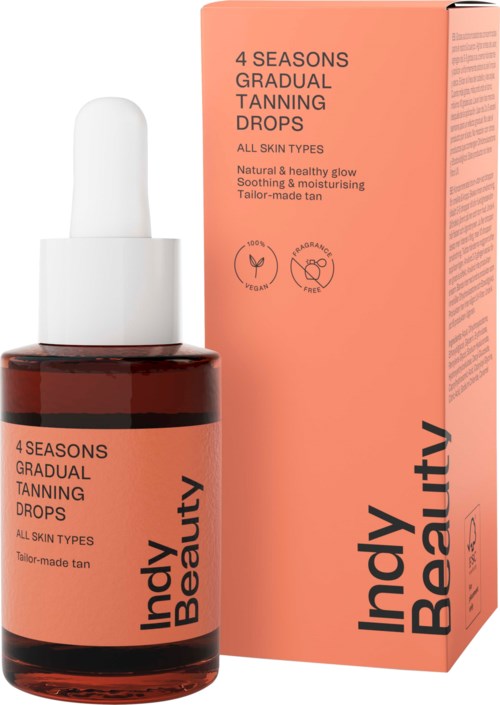 A bottle and box of tanning drops labeled 'Indy Beauty,' designed for all skin types with a focus on natural, healthy glow.