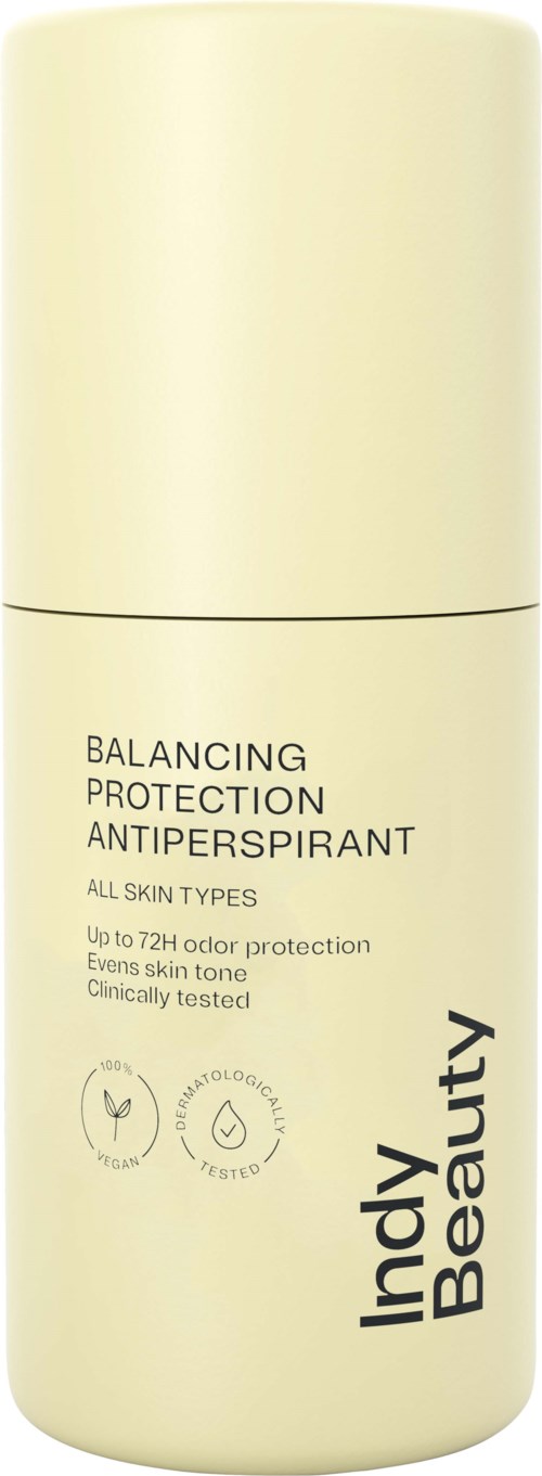 A beige bottle of Indy Beauty antiperspirant with labels mentioning skin protection and odor control.