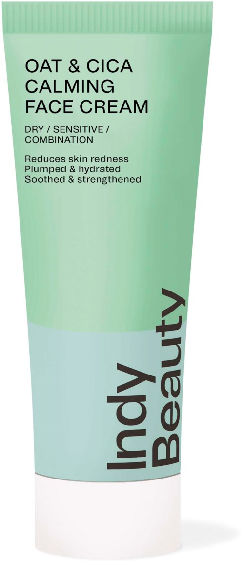 A tube of face cream labeled 'Oat & Cica Calming Face Cream' for sensitive skin, helps reduce redness and hydrate.