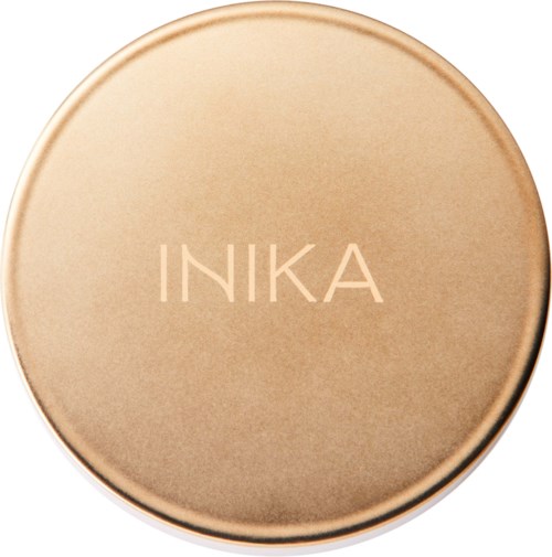 Kultakeltainen pyöreä kompaktin, jossa on teksti 'INKA'.