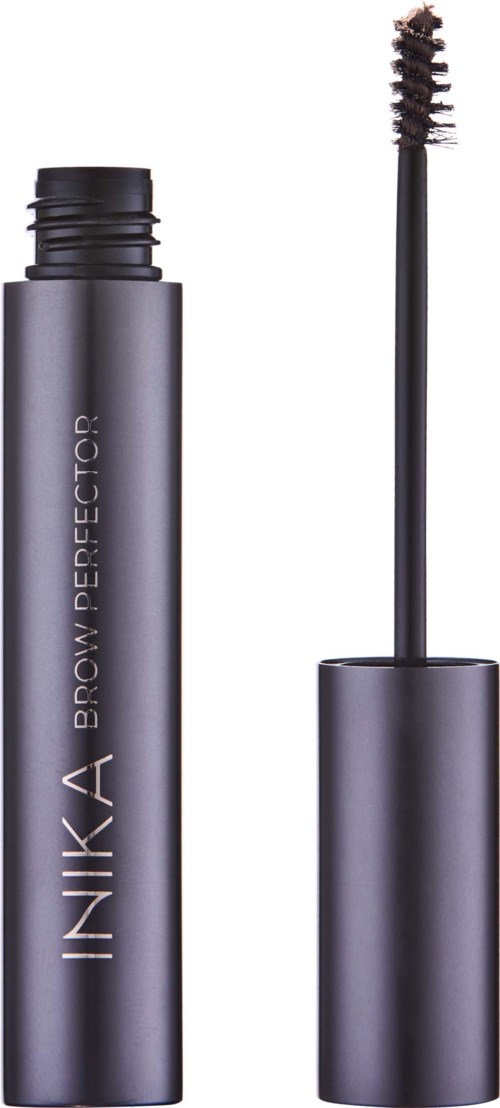 A grey mascara tube with a wand beside it. The wand has a twisted brush, and the tube has the words "INKA BROW PERFEKTOR".