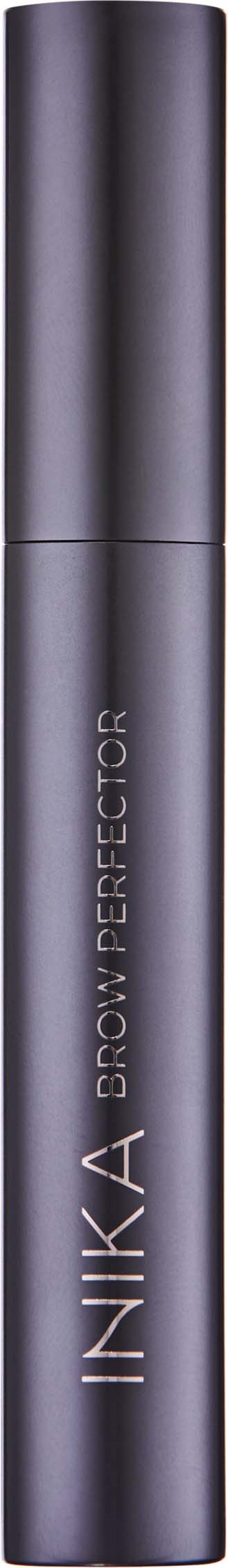 A sleek black cylindrical container with the words "INIKA GLOWPERFECTOR" on it, likely a cosmetics product.