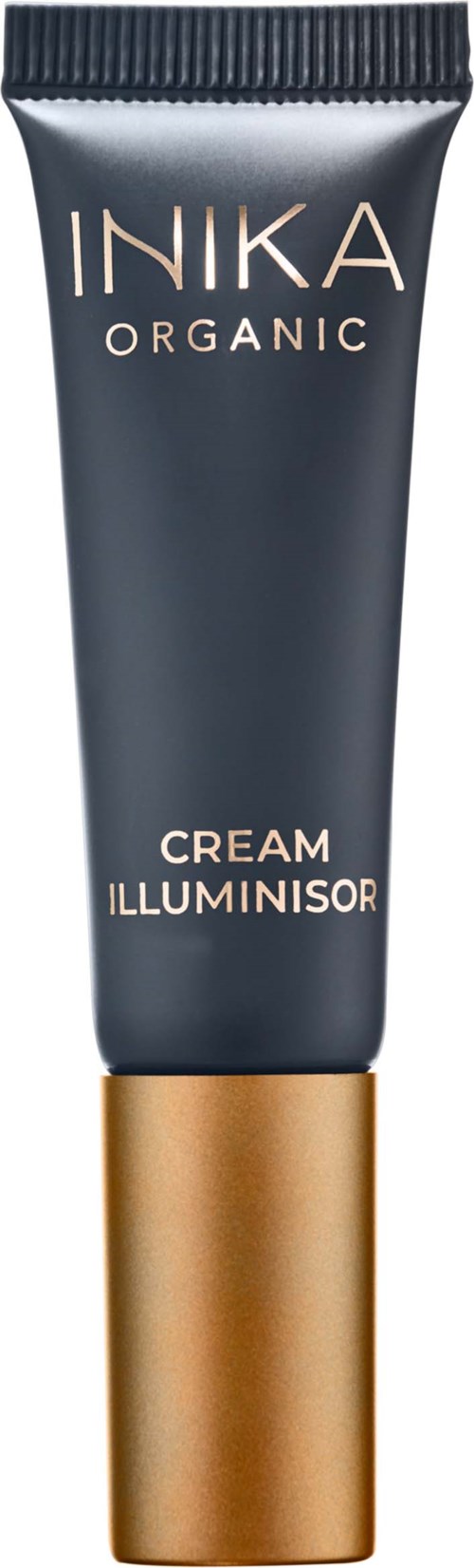 En mørk tube med gyllen lokk, merket 'INIKA Organic Cream Illuminator,' brukes til sminke for å lysne huden.