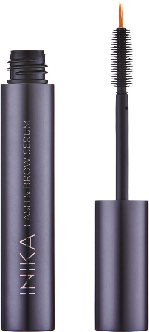A black tube with a wand applicator, labeled 'INIKA Lash & Brow Serum' for eyelashes and eyebrows.