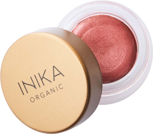 A round container of pinkish cream blush with a beige lid labeled 'INKA ORGANIC'.