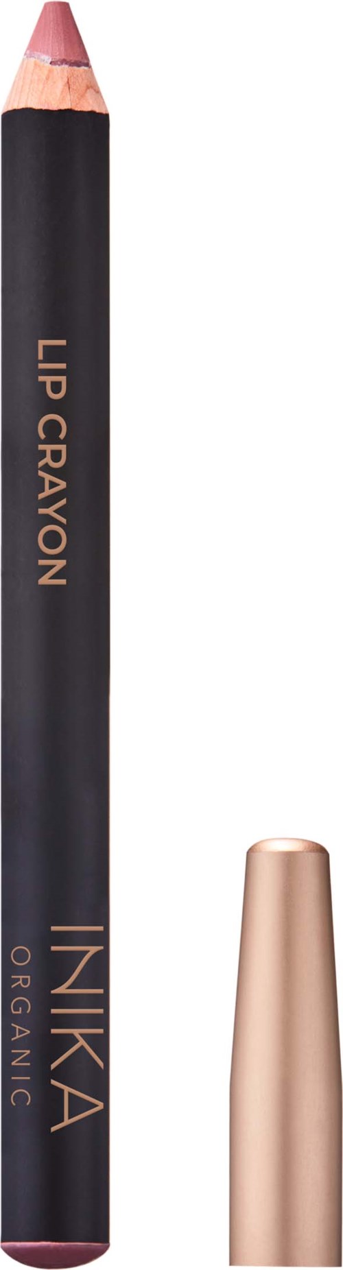 A black lip crayon with gold text, partially peeled to show pink color, and a gold cap beside it.