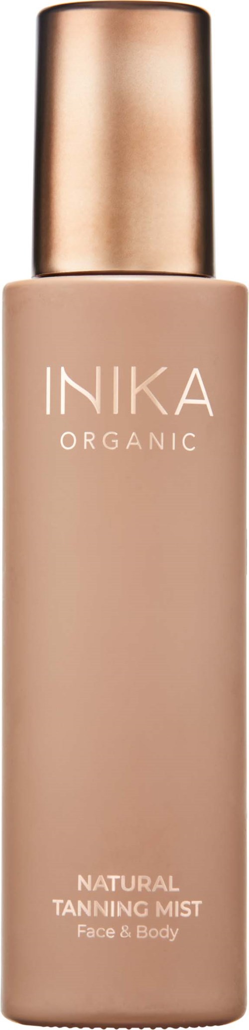 En lang flaske med INIKA Organic Natural Tanning Mist for ansiktet og kroppen med en gullhette.