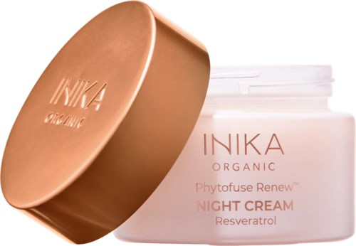 En hvit krukke med kobberlokk viser INIKA Organic Night Cream med Resveratrol. Lokket er fjernet for å vise kremen innvendig.