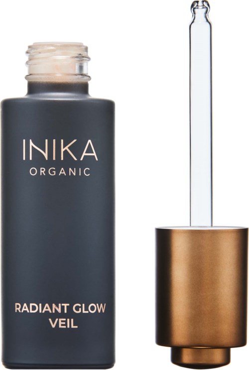 Tummas bottle, jossa pipetti, merkki 'Inika Organic Radiant Glow Veil.'