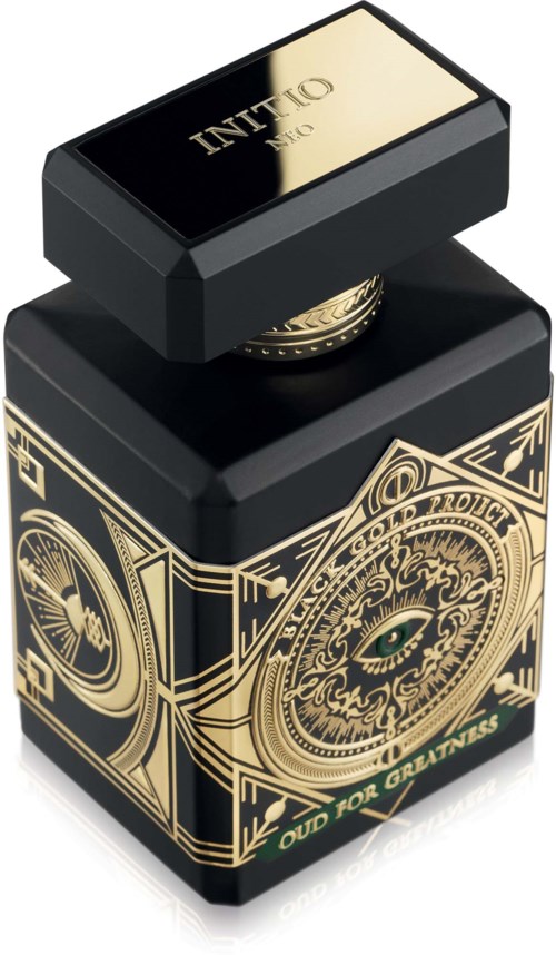 Eine schwarze und goldene Tintenflasche mit detaillierten Designs, einem Augensymbol und den Worten "OUD FOR CREATIVES".