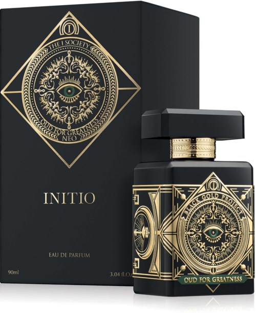 Eine schwarze Parfümflasche mit goldenen Details und Augensymbol, neben einer passenden schwarzen Schachtel mit Golddesign.