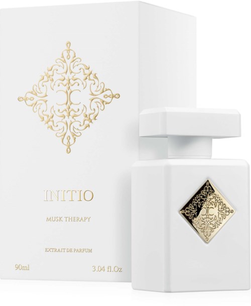 Eine weiße Parfümflasche mit gold-und schwarz verziertem Design, neben einer passenden goldenen und schwarzen Bedruckung.