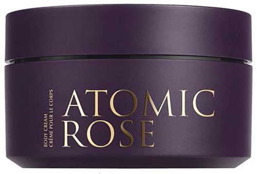 Purple container for body cream labeled 'Atomic Rose' with gold and cream text.