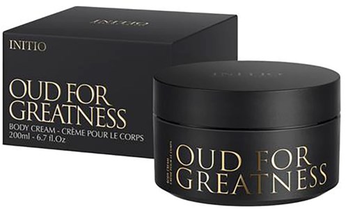 Schwarzer Behälter und Schachtel mit Gold- und Weißschrift, 'Oud for Greatness' Körpercreme von Initio.