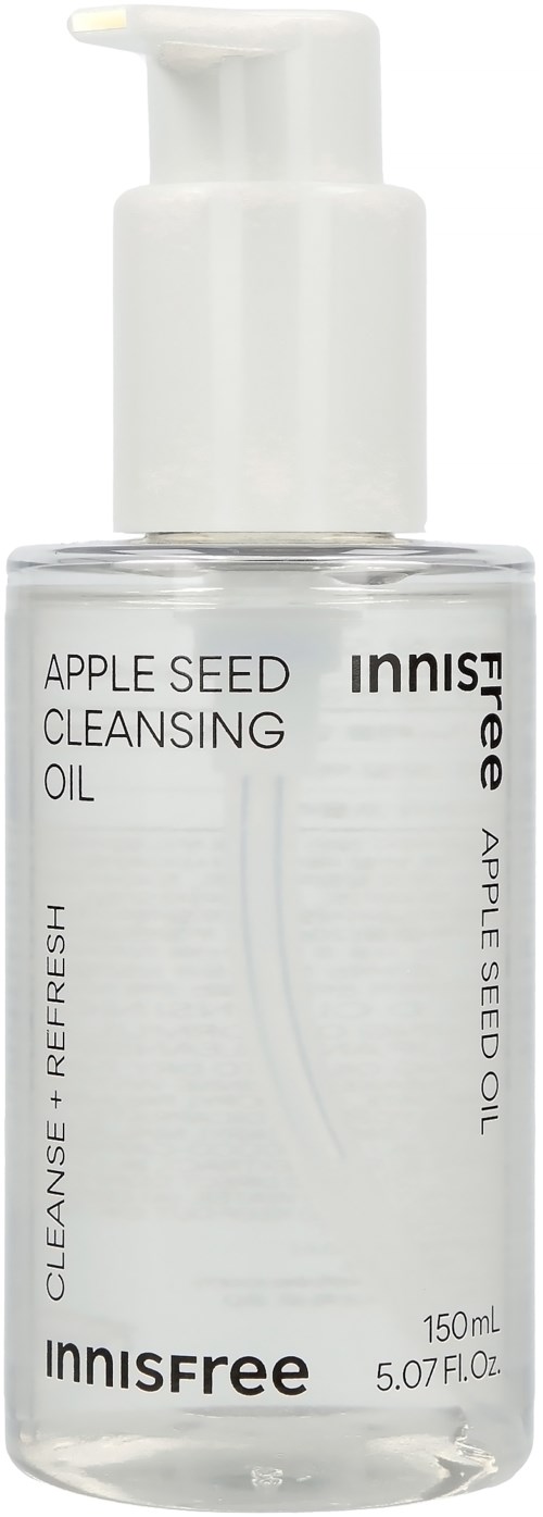 A clear bottle with a white pump, labeled as apple seed cleansing oil, with text in black and a small logo.