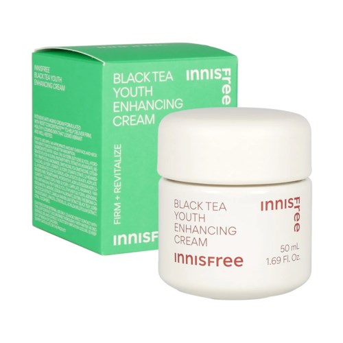 A jar of Innisfree Black Tea Youth Enhancing Cream and its green box packaging.