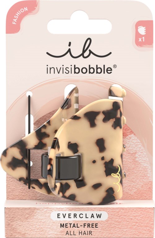 A leopard-print hair clip with metal-free all hair hair style, packaged in pink and white branding.