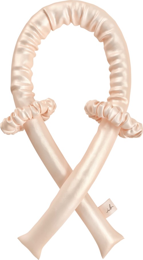 A balloon shaped like a pair of crossed, pearl-colored satin ribbons with ruffled edges.