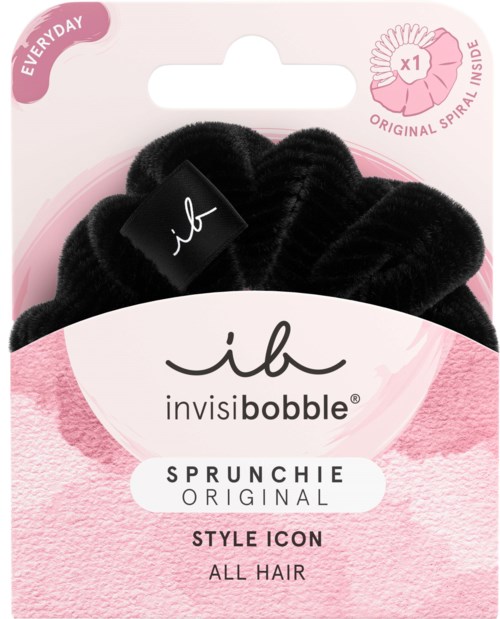 Black hair scrunchie inside packaging, labeled as 'invisibobble' for all hair types, with pink and white design.