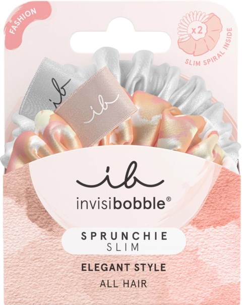 En förpackning med hårsnoddar i pastellfärger och en logga som säger 'ib invisibobble' inuti och utanför.