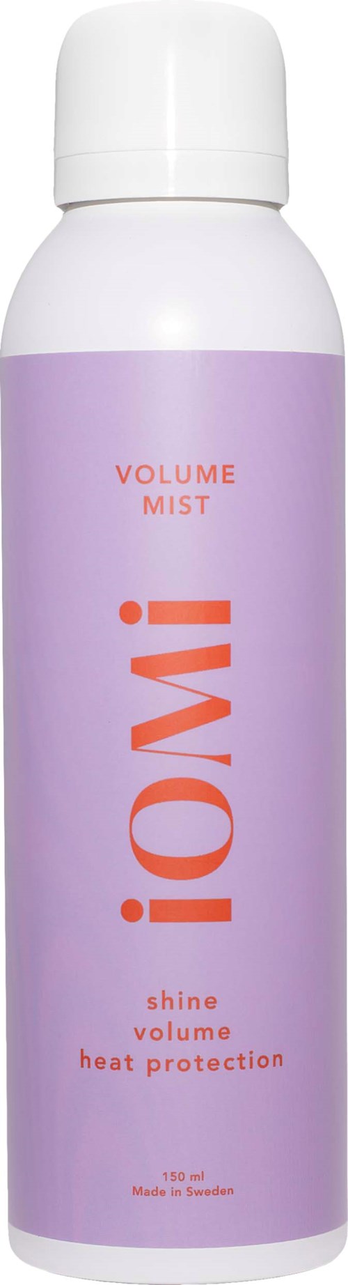 A white and purple spray can labeled 'Volume Mist' for shine, volume, and heat protection.