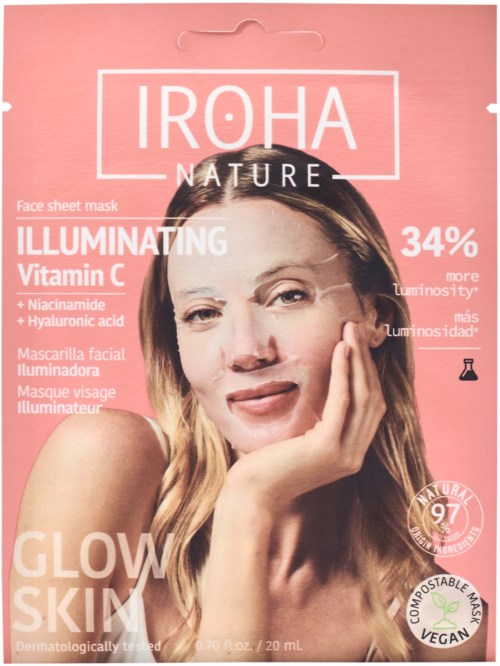Roze verpakking met een vrouw die een gezichtsmasker gebruikt. Tekst benadrukt vitamine C en stralende huid.