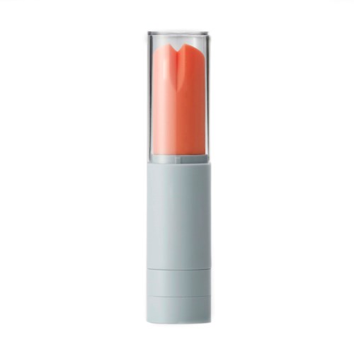 Ein kleines Gerät mit weißer Basis und klarem Deckel, der eine rosa-orange Form zeigt.