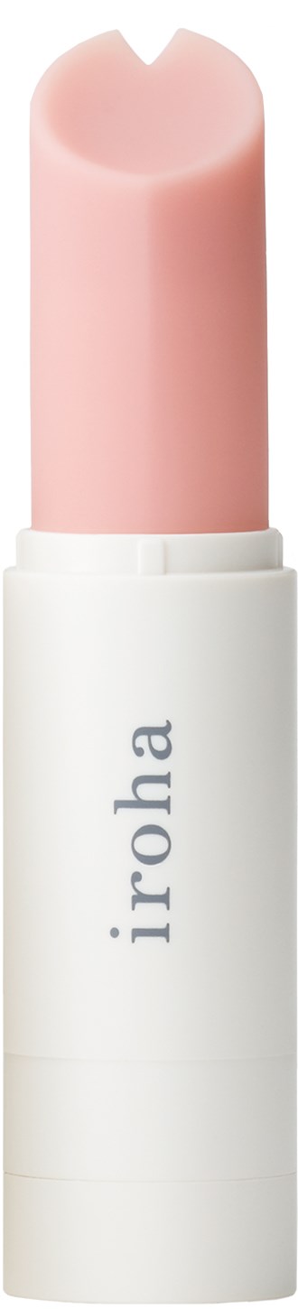A light pink stick of lip balm in a white container with the brand name 'iroha'.