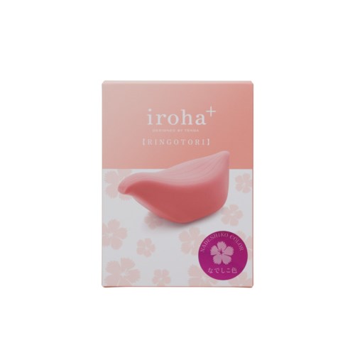 Die Box zeigt einen pinken Schönheitsschwamm und japanischen Text, mit Blumenmuster und lila Siegel auf rosa Hintergrund.