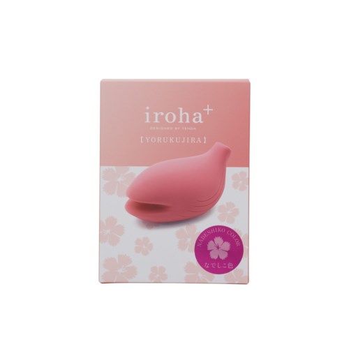 Ein rosa Nasenspray-Gerät auf einer rosa und weißen Box mit Blumenmustern und japanischen Zeichen.
