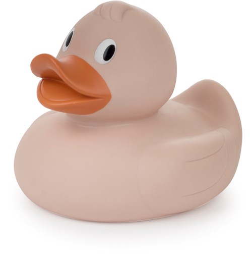 En stor gummiducka med stora ögon och orange näbb, flytande och vänder sig lite åt vänster.