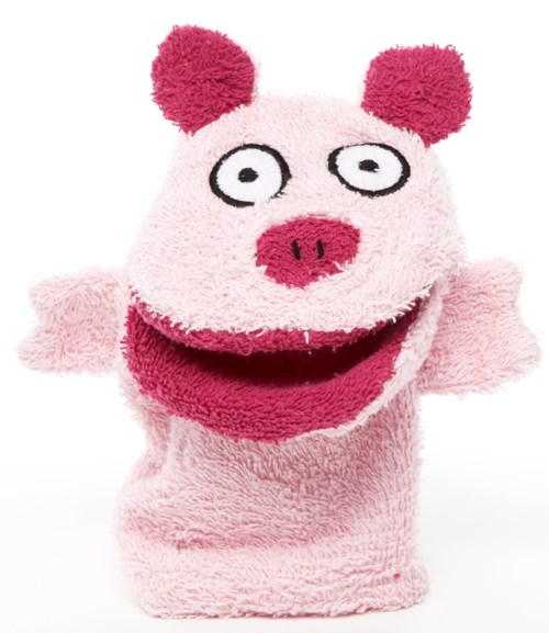 En rosa fluffig handdocka med stora ögon, en snabel och stora svarta och vita ögon, som ler brett.