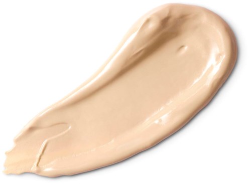 Cremafarbene Creme oder Lotion auf weißer Oberfläche verteilt. Glatte Textur mit einigen leichten Rillen.