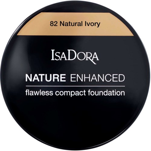 En kompakt makeupgrundkrämbehållare i svart och beige färg, märkt som IsaDora Nature Enhanced, nyans 82 Natural Ivory.