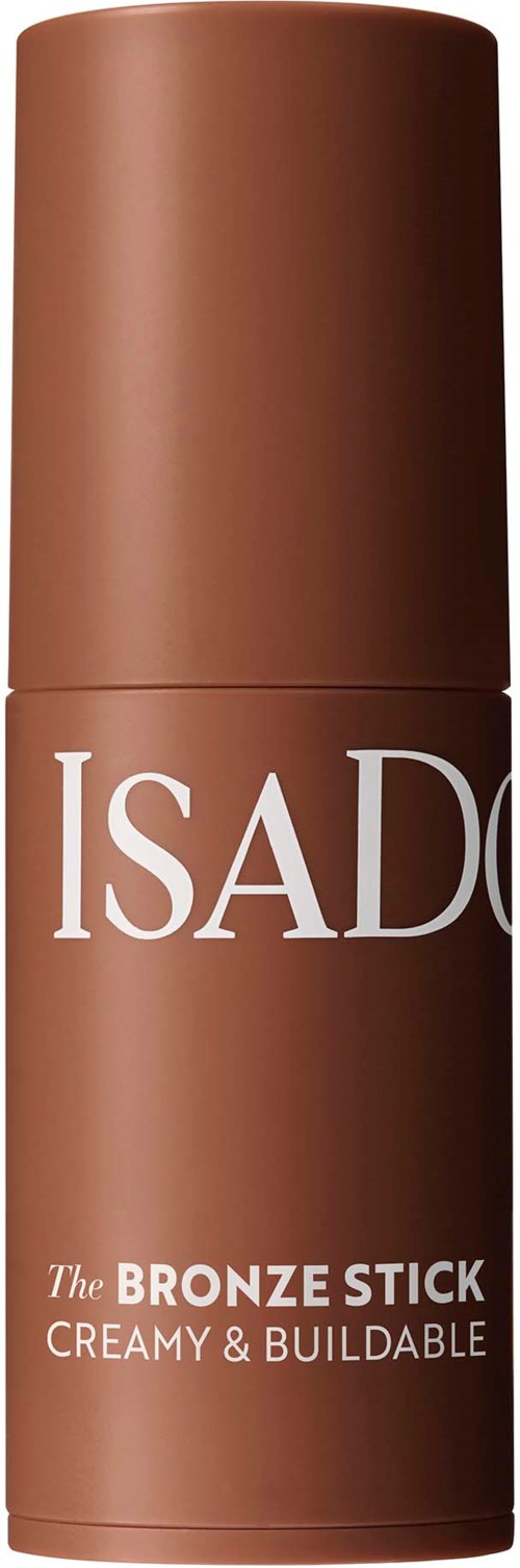 A brown stick with white text that says "The BRONZE STICK" and describes it as creamy and buildable.