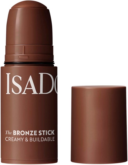 Een bruine stick deodorant met verwijderbare dop, gelabeld 'ISAD', 'Bronze Stick', 'Creamy & Buildable'.