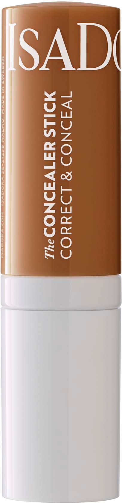 Ein Concealer-Stick in Beigefarbe, beschriftet 'ISAD,' genannt 'The Concealer Stick' für Korrektur und Abdeckung.