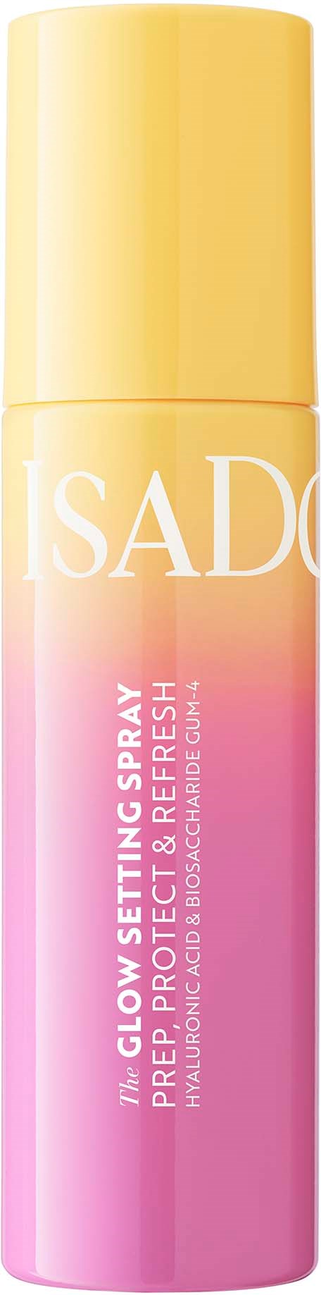 A spray can with a yellow cap and a pink body, labeled 'ISAD' and 'Glow Setting Spray' for a fresh glow.