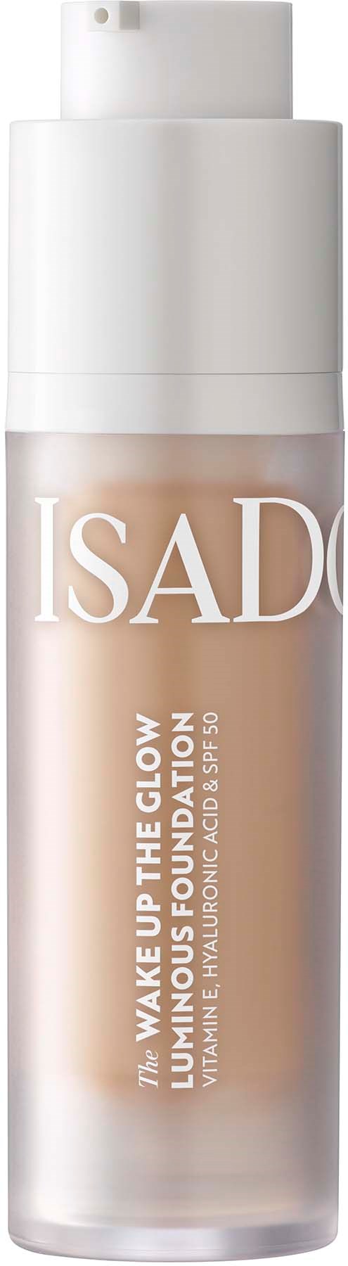 A beige foundation bottle with a white pump cap and label, labeled "ISADORA" and "Wake Up The Glow."