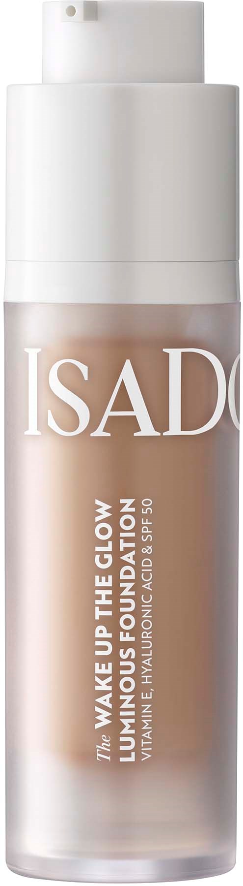 Eine beige Foundationflasche mit weißem Pump, beschriftet 'ISADORA' und 'Wake Up The Glow'.