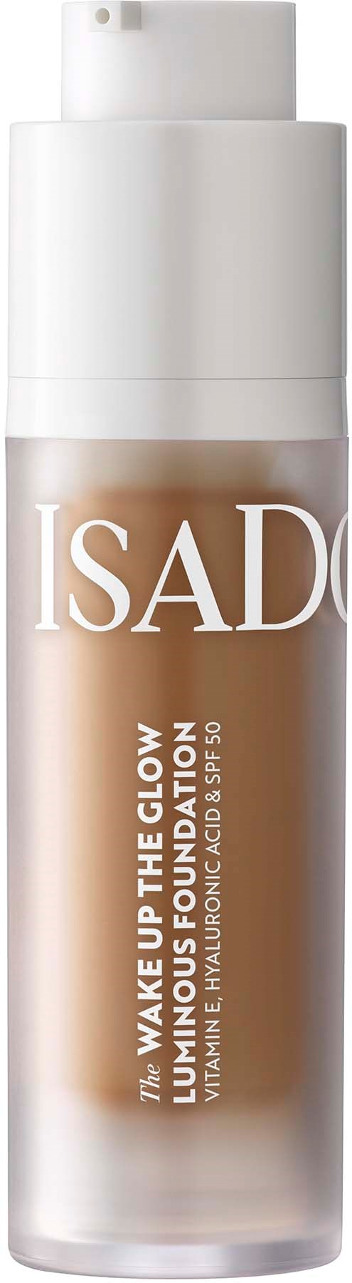 A bottle of Isadore foundation with pump, in beige color with white cap.