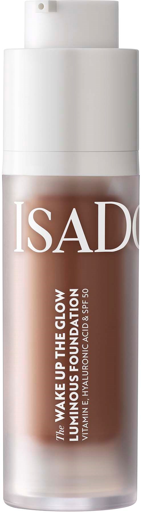 A skincare bottle labeled ISADORA, called Wake Up The Glow, used for foundation and skincare.