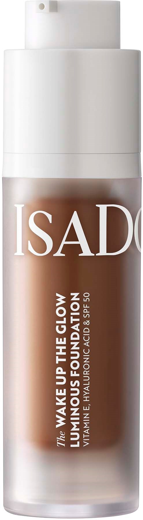 Eine Flasche ISADORA Wake Up The Glow Foundation mit Pumpenspender. Für strahlende, hydratisierte Haut.