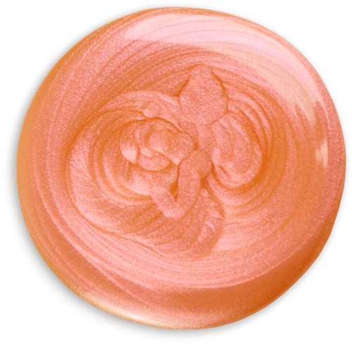 A round, pinkish soap with swirled patterns and a flower-like design in the center.