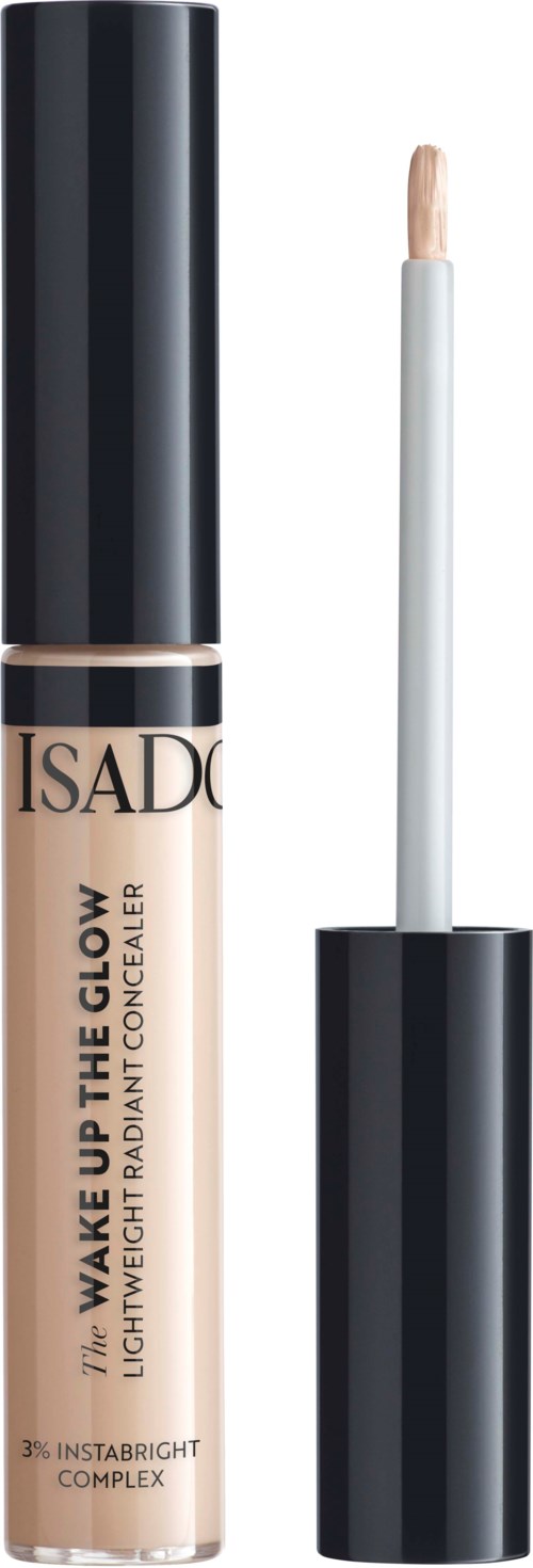 En concealer i tub med svart och beige design, med applikator och texten "ISA D'OR" och "WAKE UP THE GLOW."